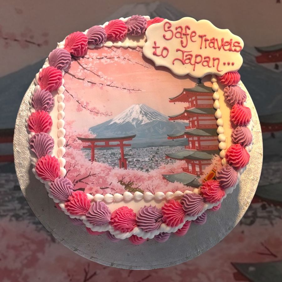 Japan travel themed cake with Mount Fuji scene