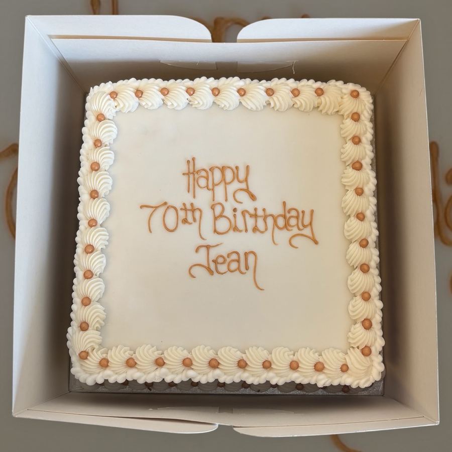 Hand-piped 70th birthday cake