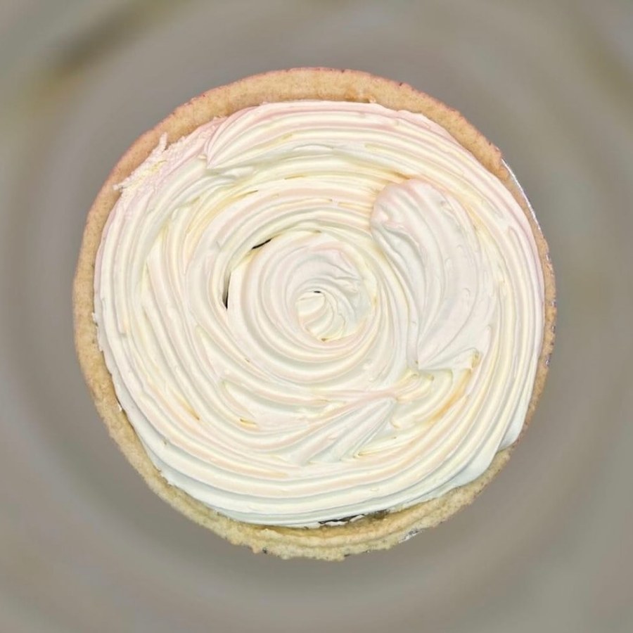Counter cake with cream swirl finish