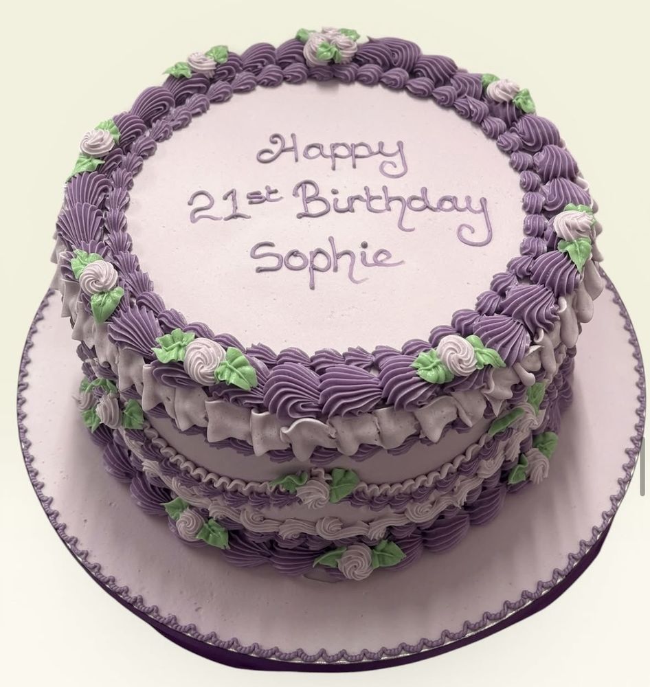 Lilac Lambeth cake with piped roses for a 21st birthday
